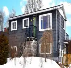 Single story home featuring ac unit