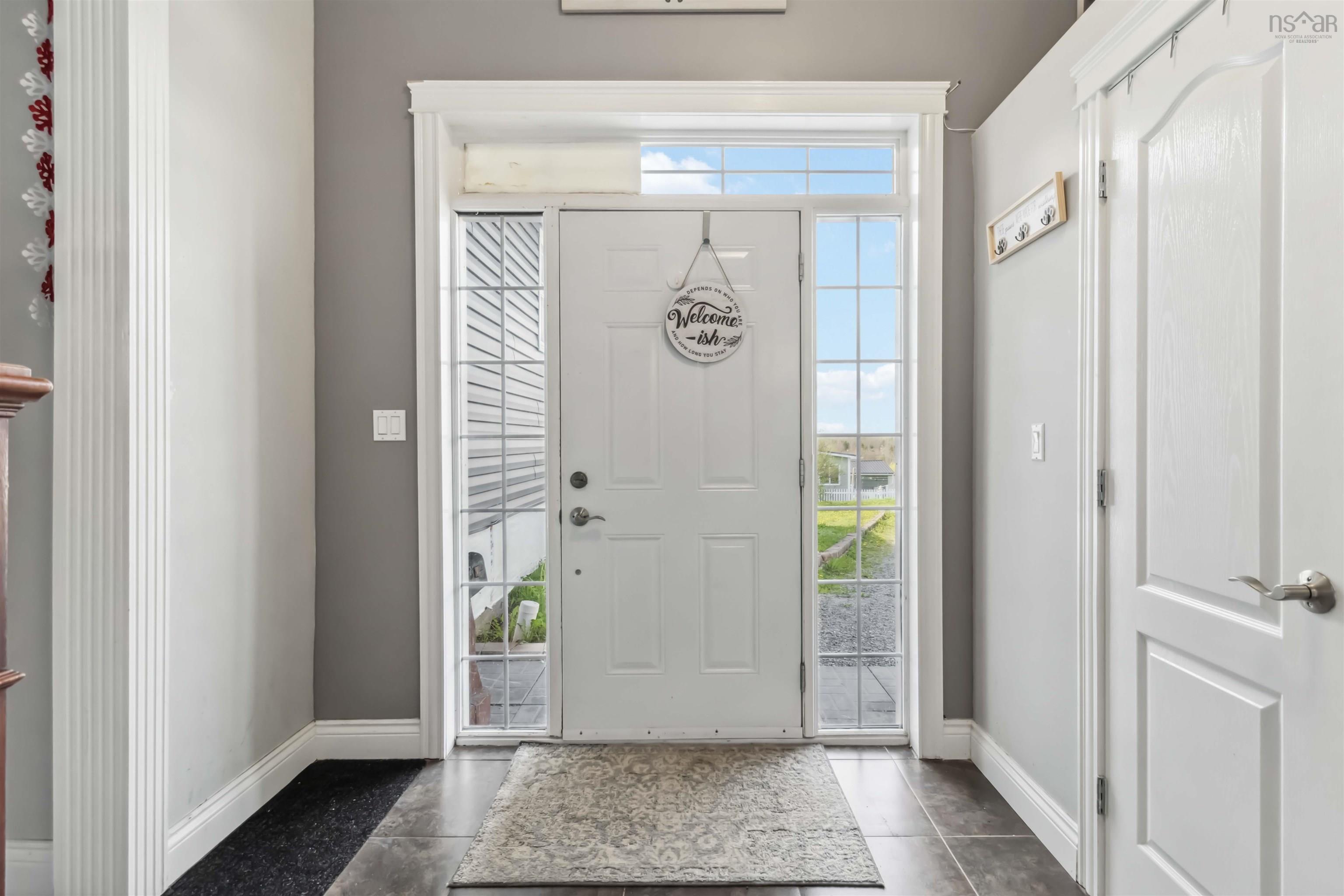 Foyer featuring baseboards