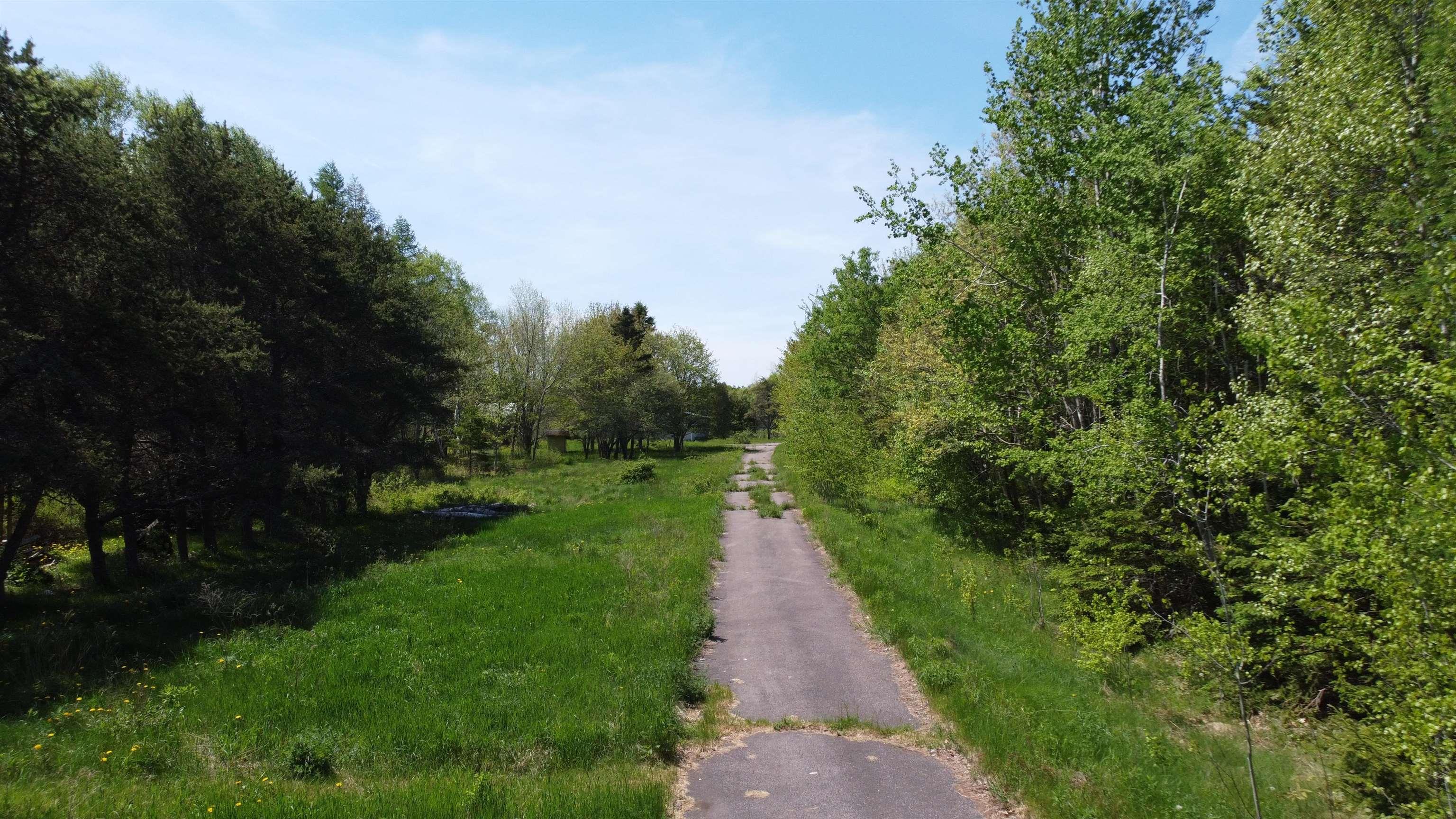View of street with a wooded view