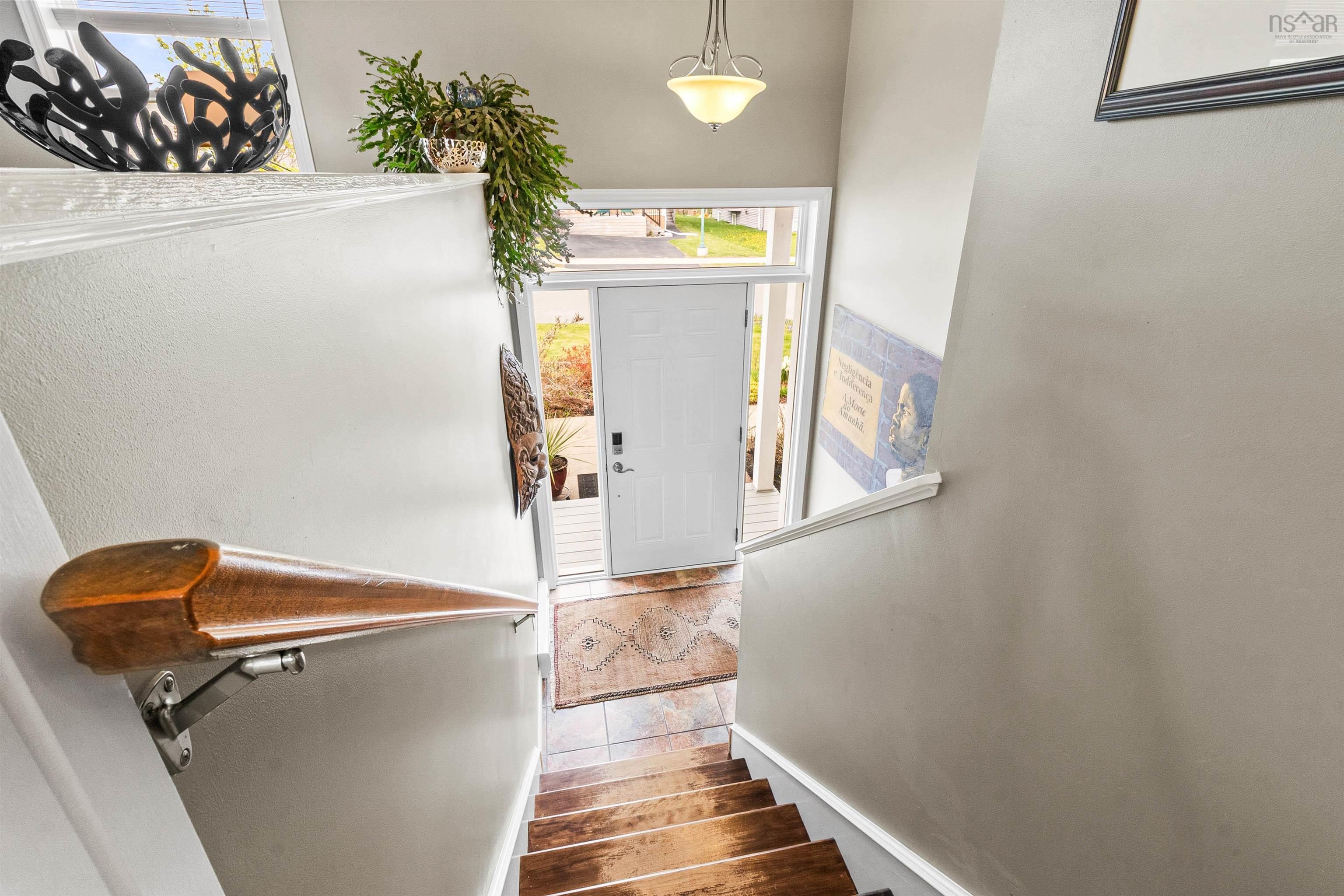 Entryway featuring stairs
