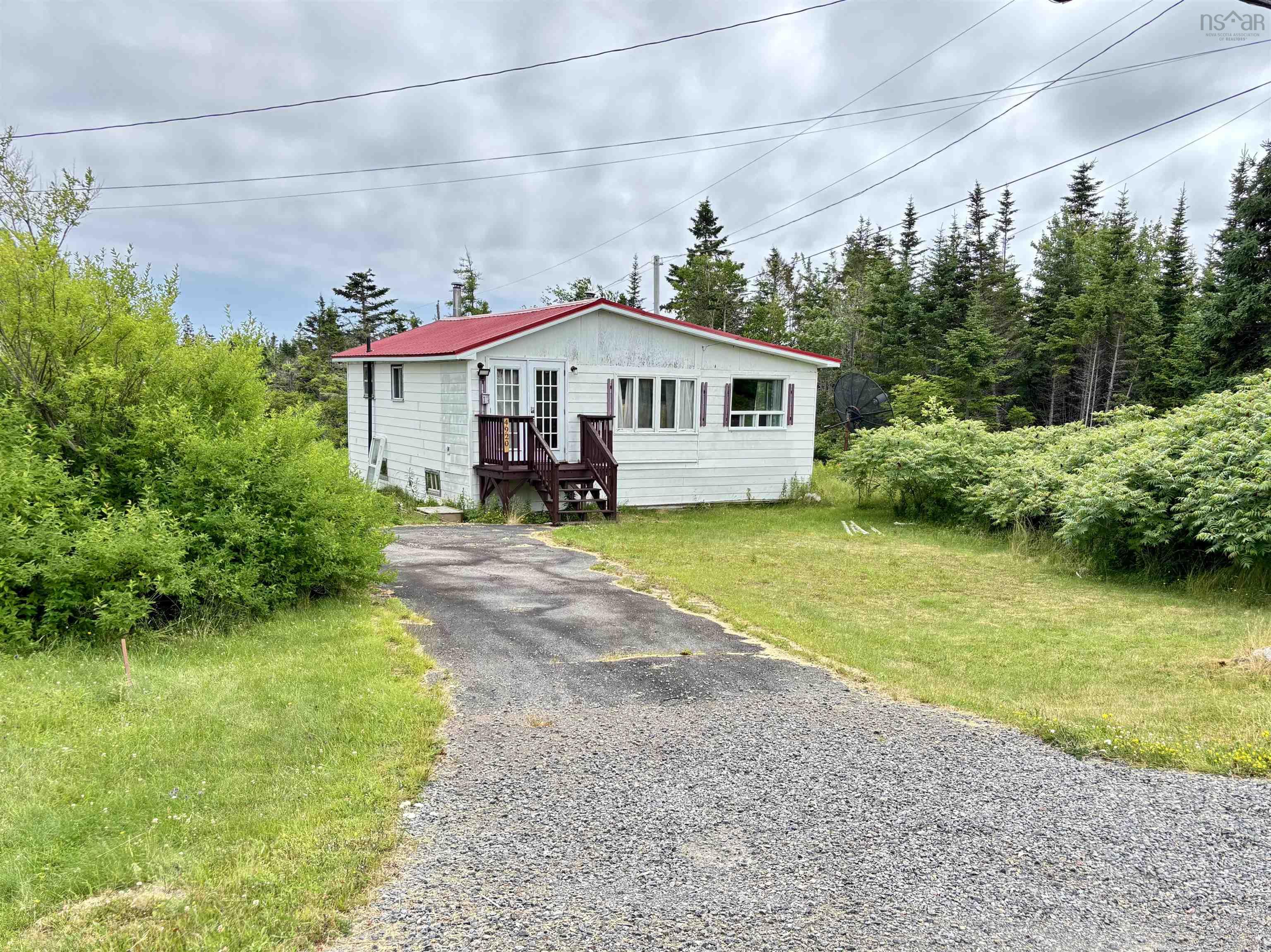 View of front of property featuring driveway