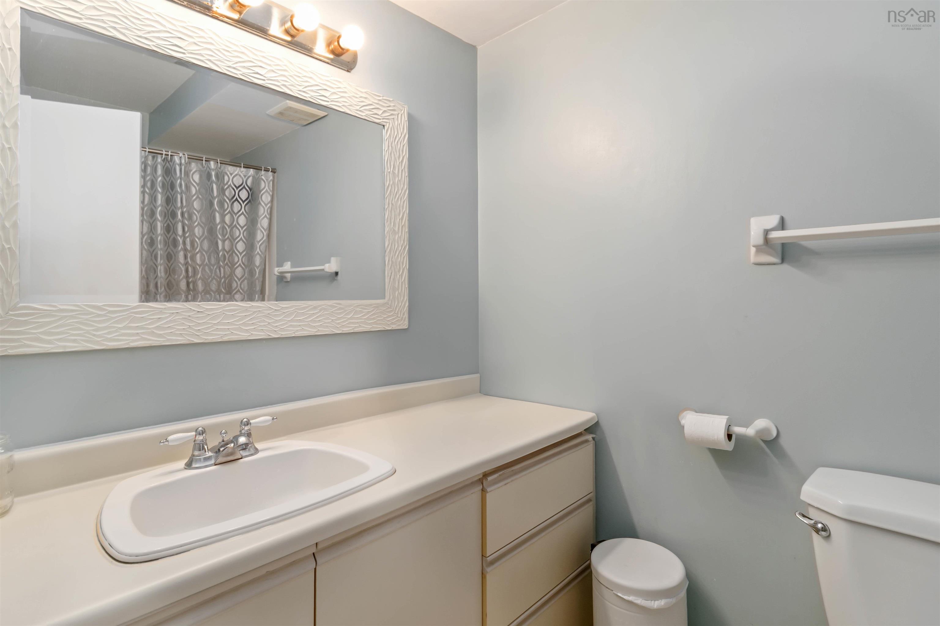 Bathroom with toilet and vanity
