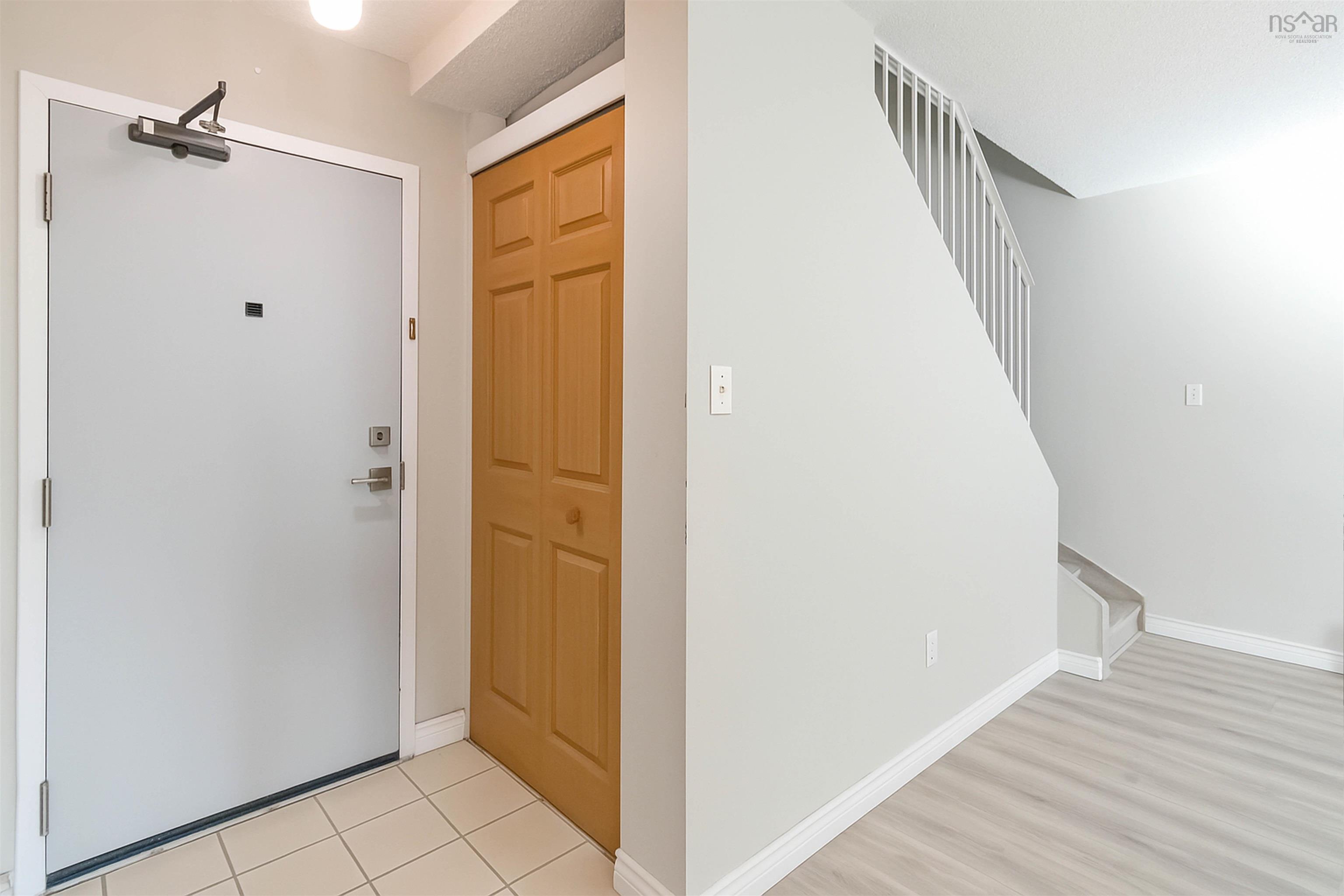 Foyer entrance featuring stairs
