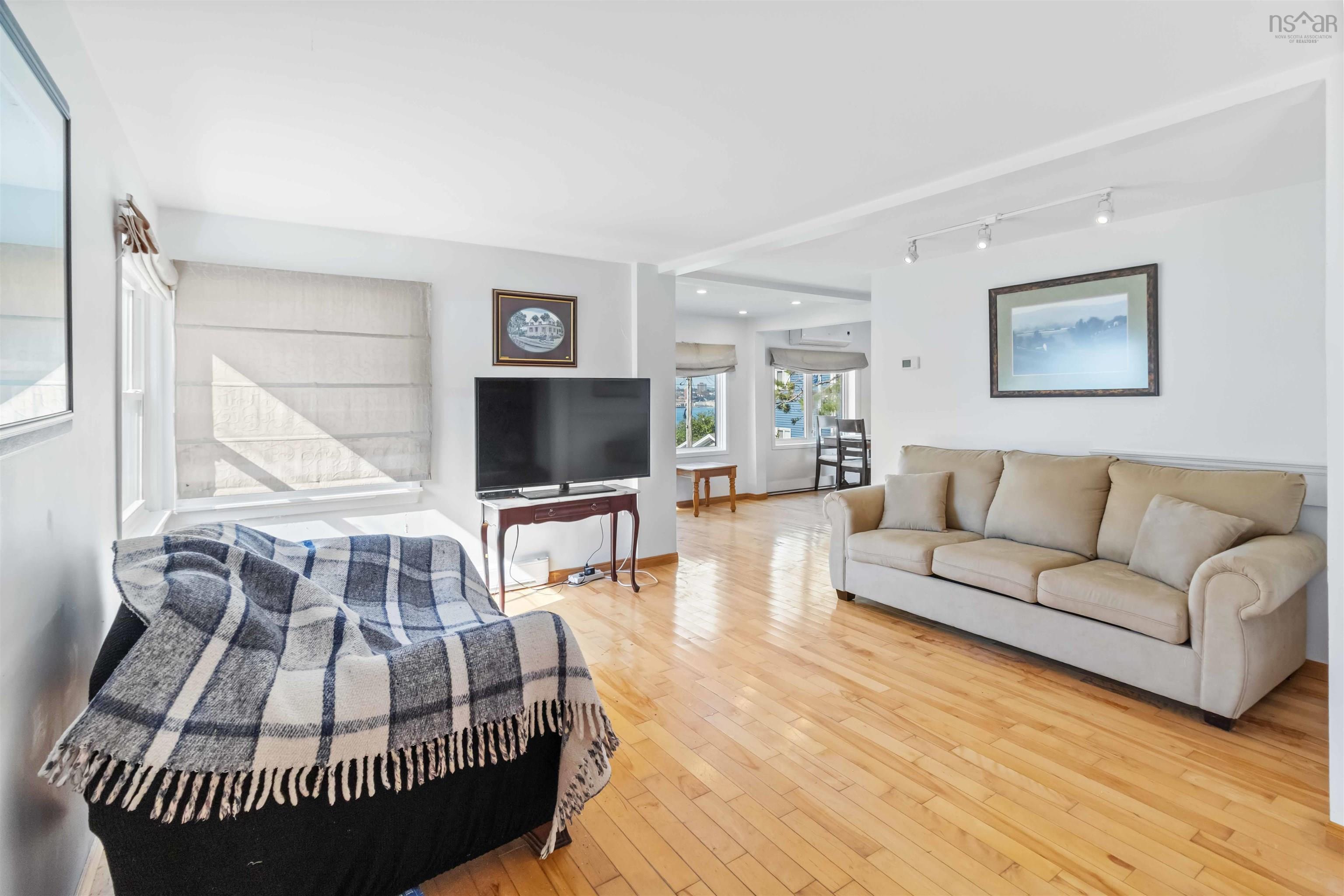 Living room with hardwood / wood-style floors