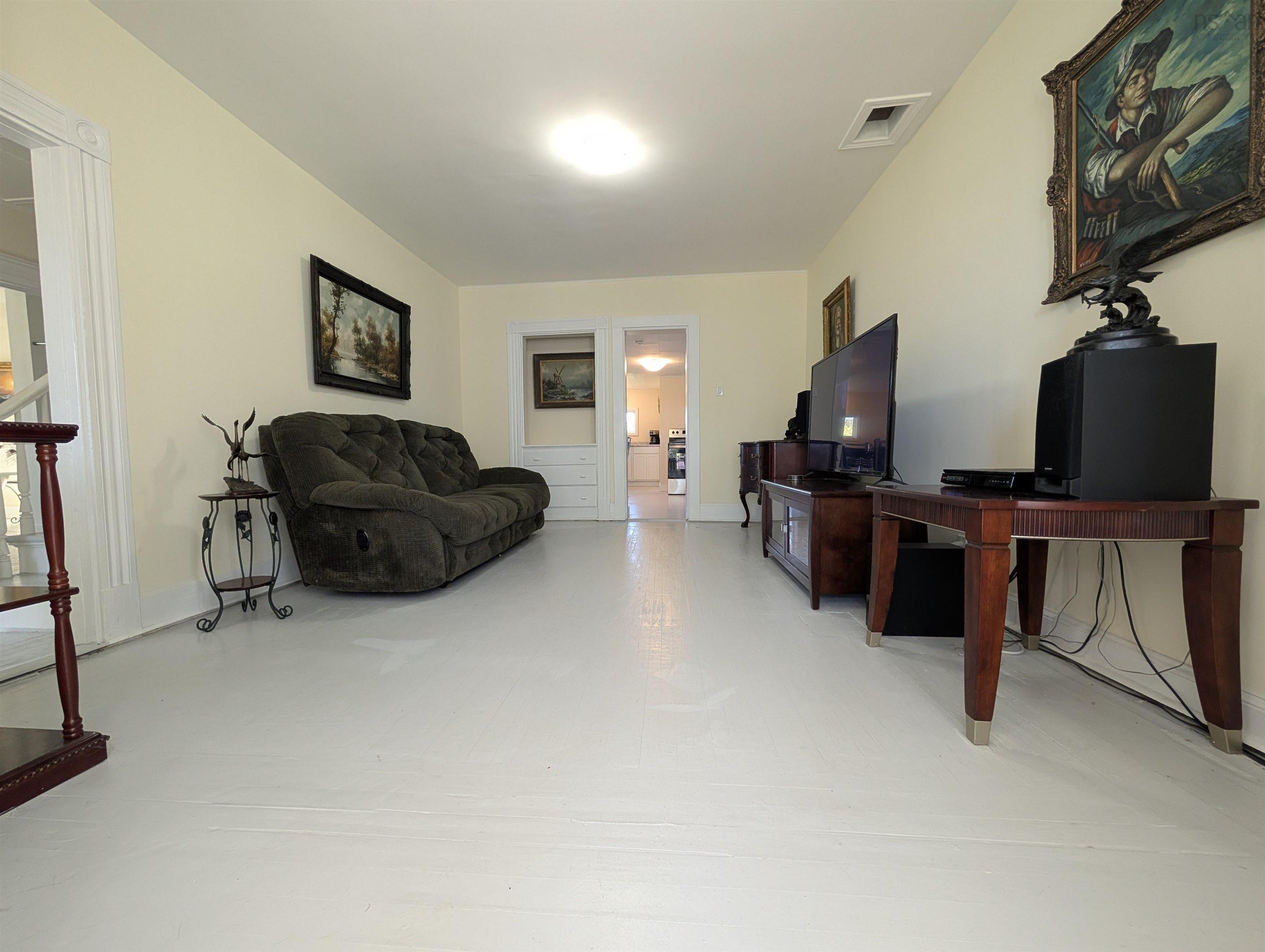 Living room featuring baseboards