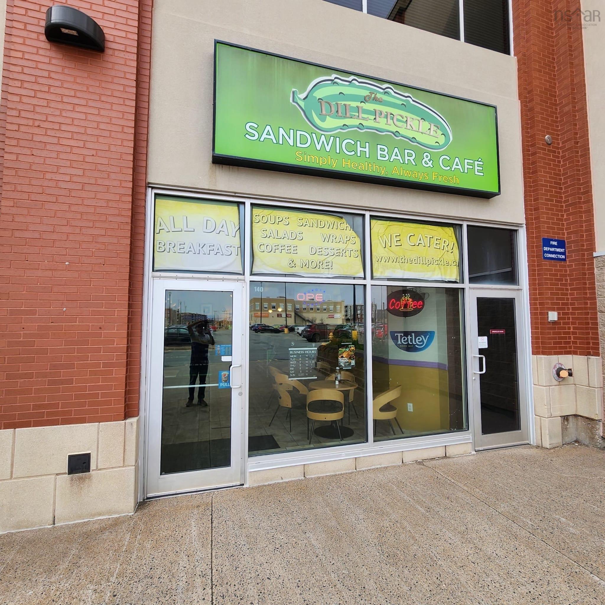 Property entrance with brick siding and crawl space